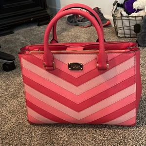 Almost brand new Michael Kors handbag. Various shades of pink. Super cute!